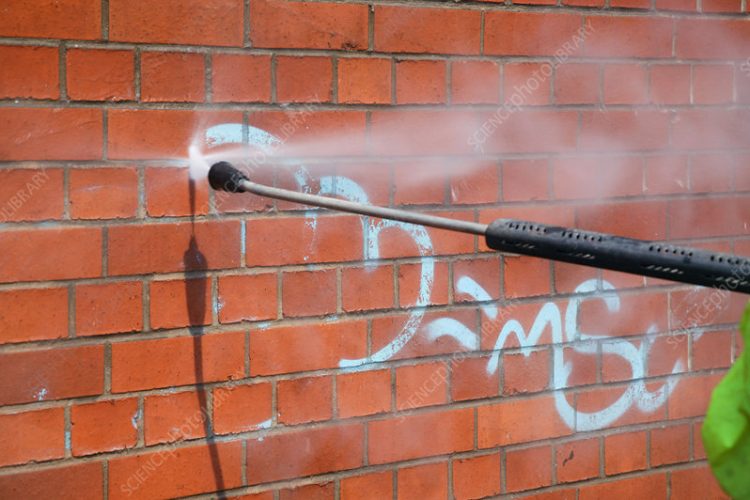 Image not to be used in a defamatory context  
Chemical free graffiti removal on Woolpack Lane, Nottingham.